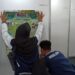 Usai Registrasi, Tim Pimnas UB Pasang Poster PKM PIMNAS