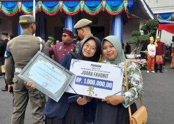 Siswi SMKN 12 Abadikan Keunikan Kota Malang