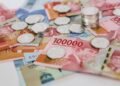 Rupiah Tembus Rp18.099, IHSG Malah Berbalik Menguat